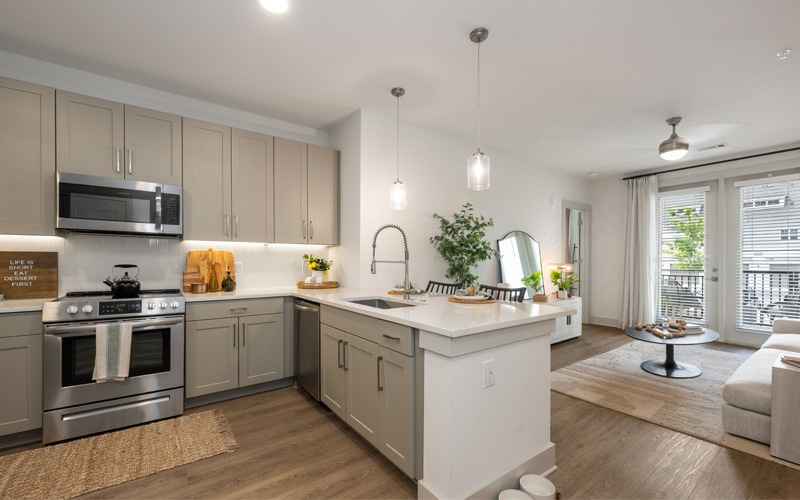 a kitchen with white cabinets