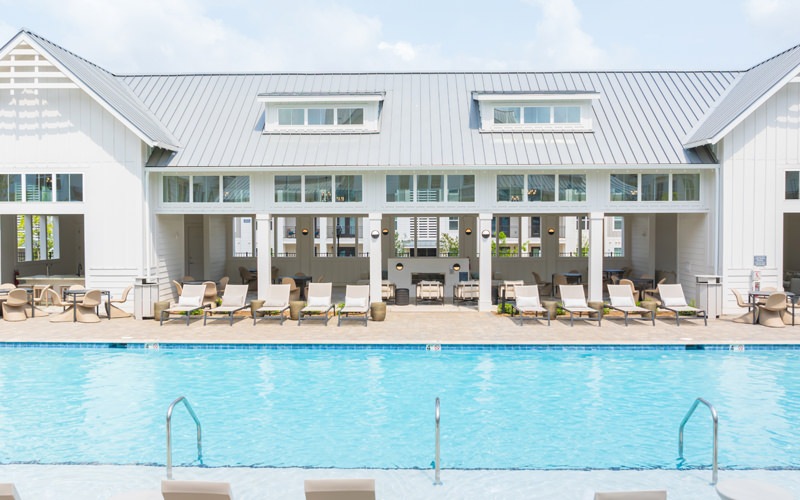 a pool behind a house