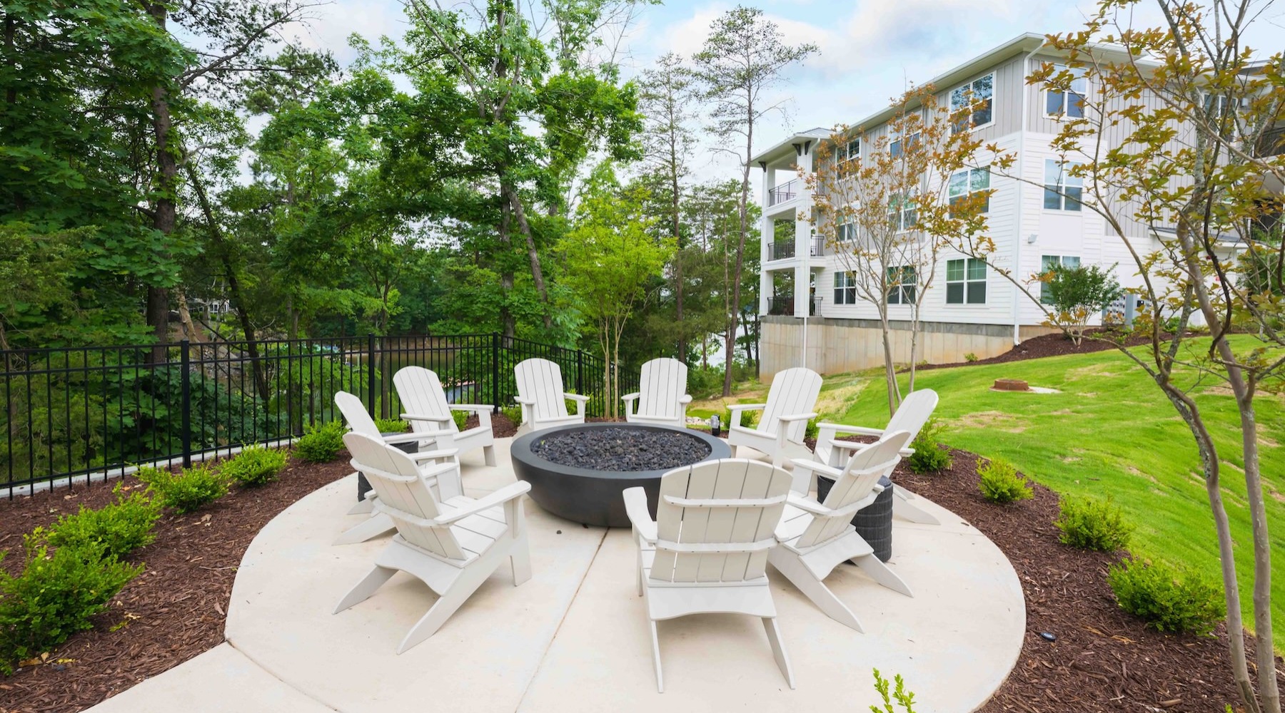 a fire pit area with seating